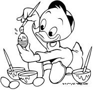 Louie painting Easter eggs